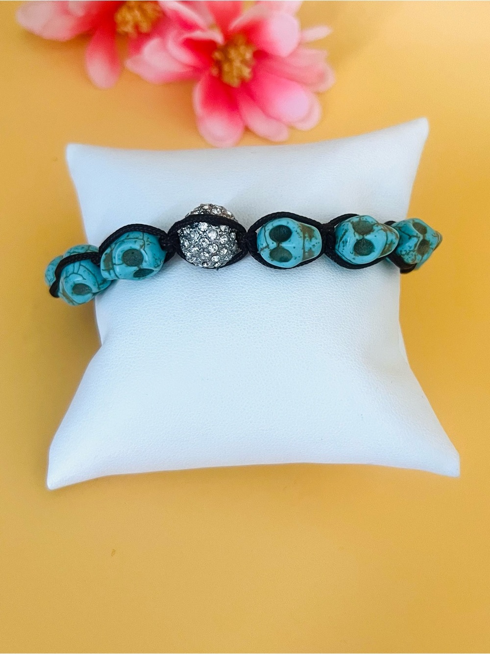 Carved turquoise adjustable bracelet, with round paved charm
